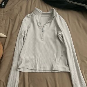 Cropped lulu zip up cream colored